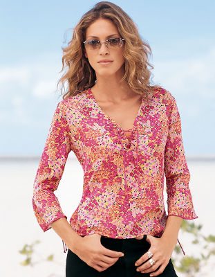 Lace-up floral shirt.