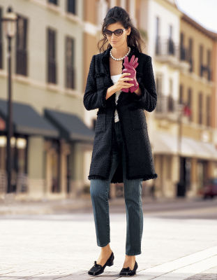 Bouclé coat with fringe.