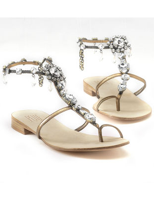 Ankle-strap jeweled sandals.