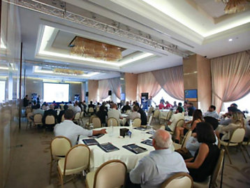 Attendees at the Seminar,People sitting sround tables while at the Seminar