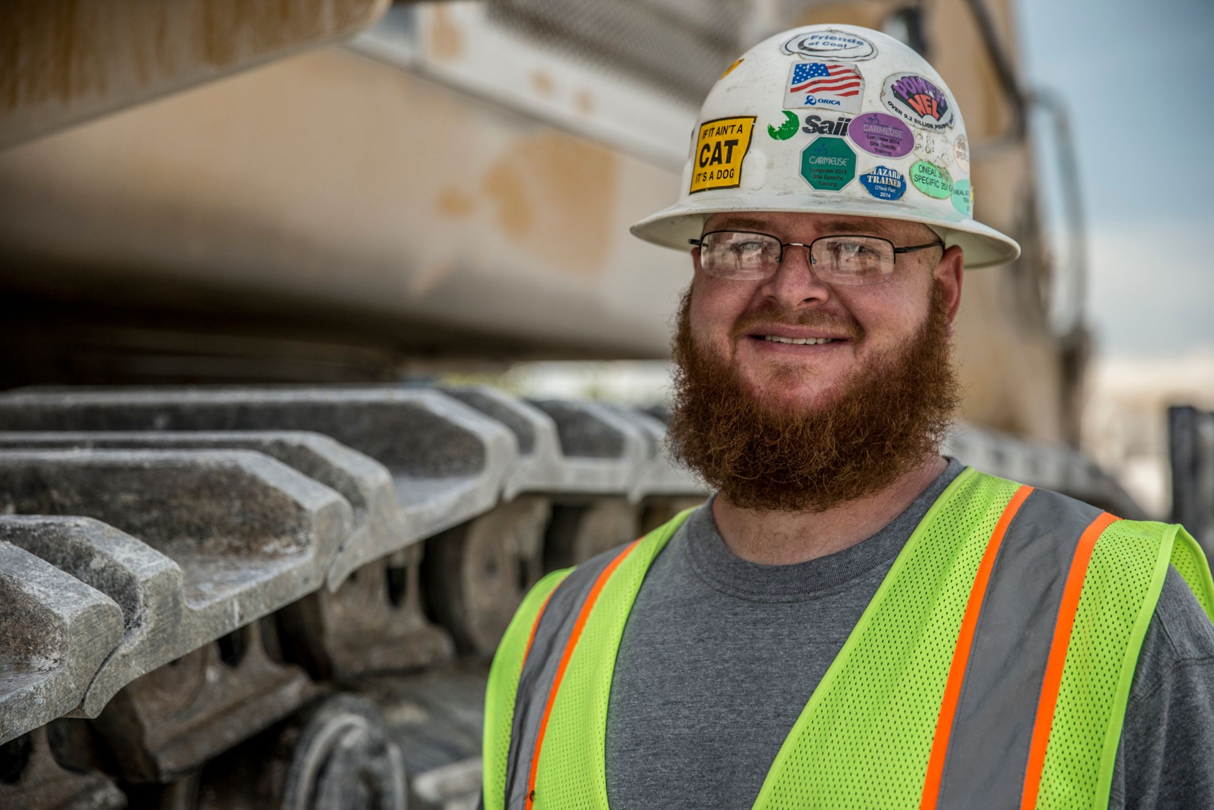 Shovel Operator John Harris enjoys the improved operator environment of the 6015B. “Overall, to me, it’s better for the operator because the cab is bigger. And the controls are very easy. You can operate them with three fingers.”