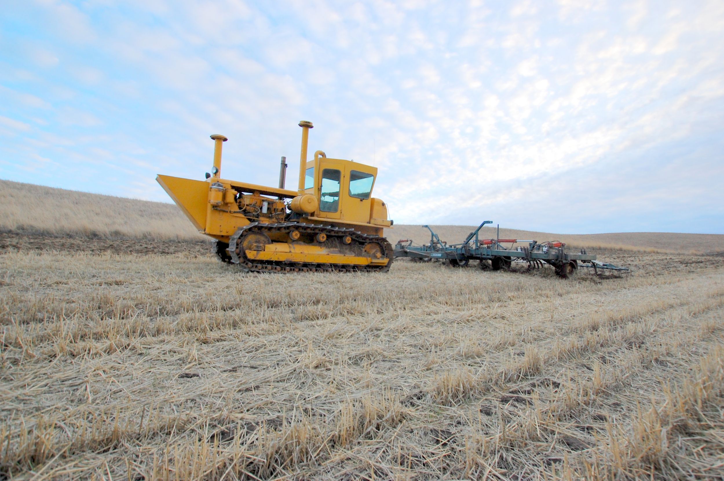 One of the many hot-rodded Cat<sup>®</sup> D7s of Whitman County, with engine, transmission, and undercarriage modifications typical of the region, pulling a chisel plow on the Swannack farm outside St. John, Washington.