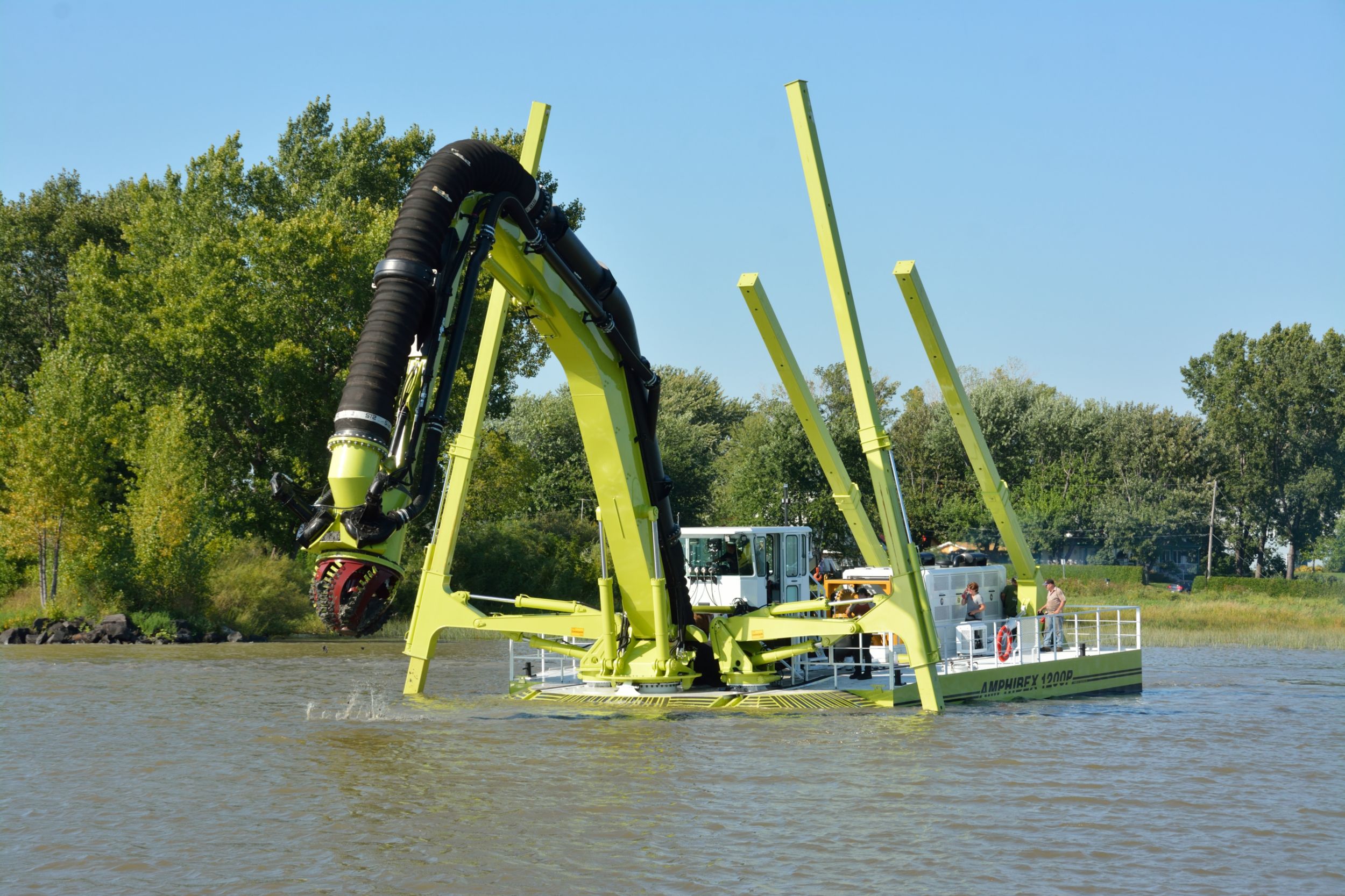 Amphibex machines, powered by Cat® engines, are specifically designed to efficiently and safely perform dredging chores in the gap between shore and deep water. 