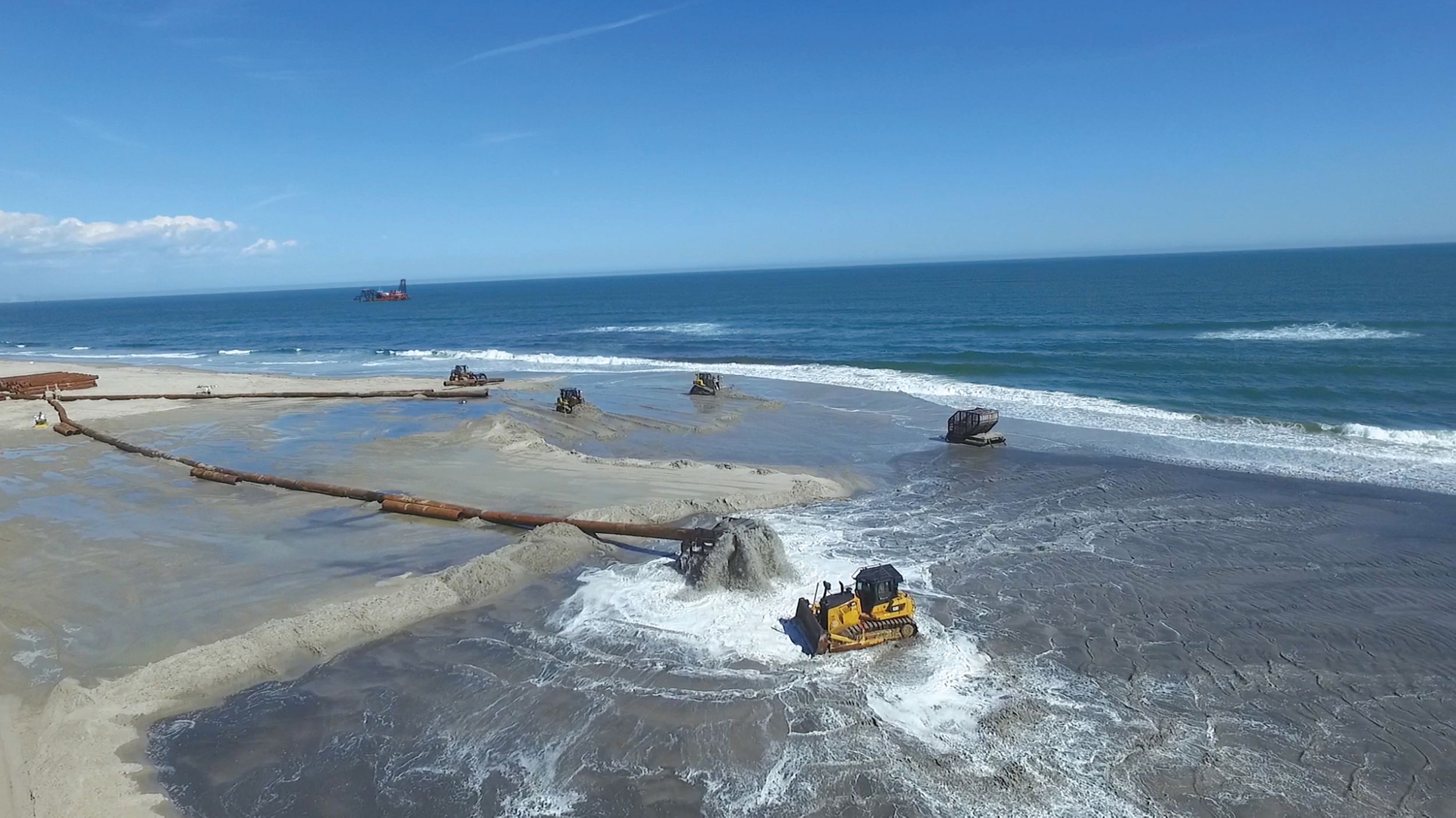 A massive, multi-million dollar Army Corps of Engineers project to restore the beach and natural infrastructure has been ongoing since shortly after Sandy subsided, with Great Lakes Dredge & Dock and their fleet of Cat® machines at the forefront.