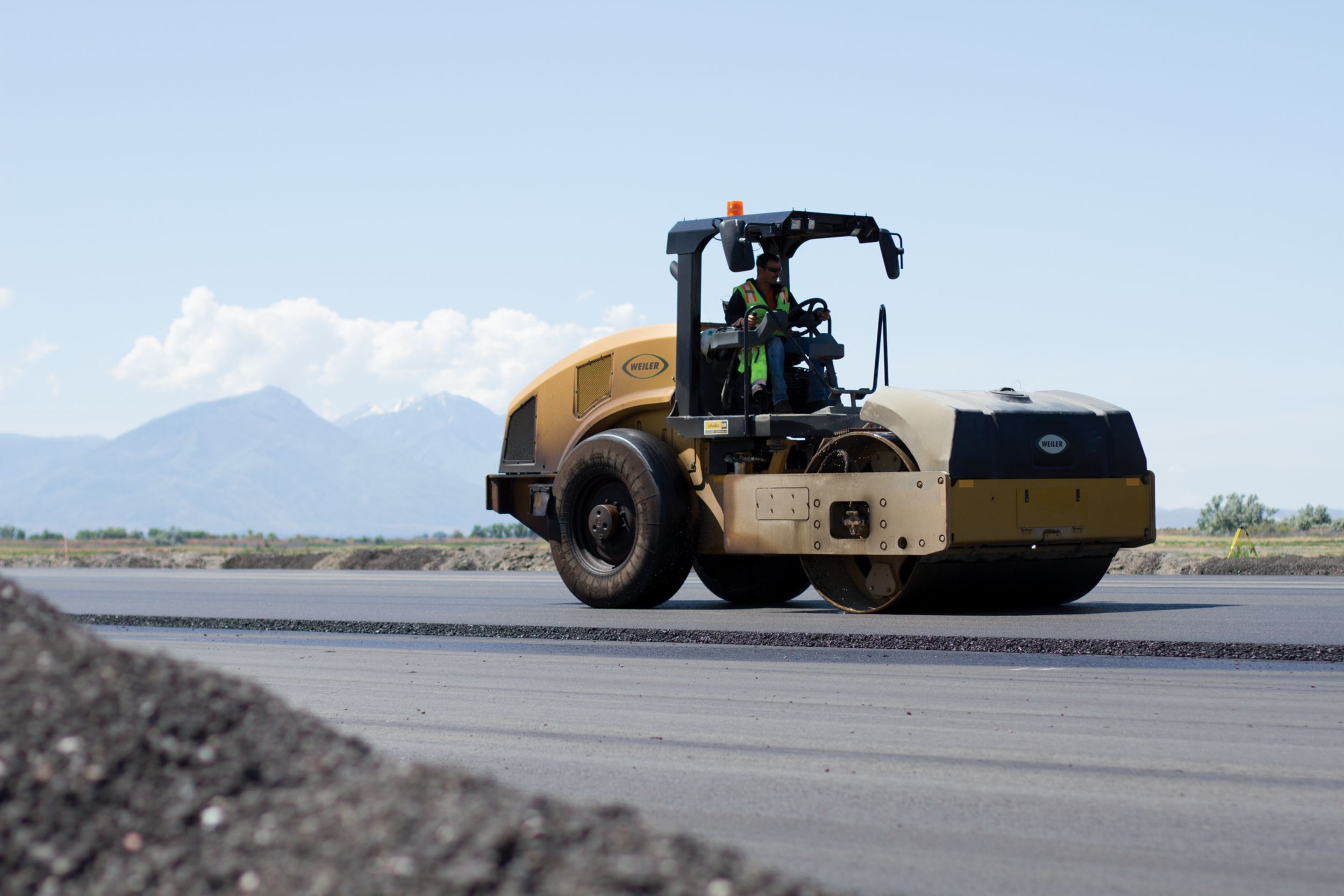 Two Weiler C110 Combination Compactors performed final compaction.