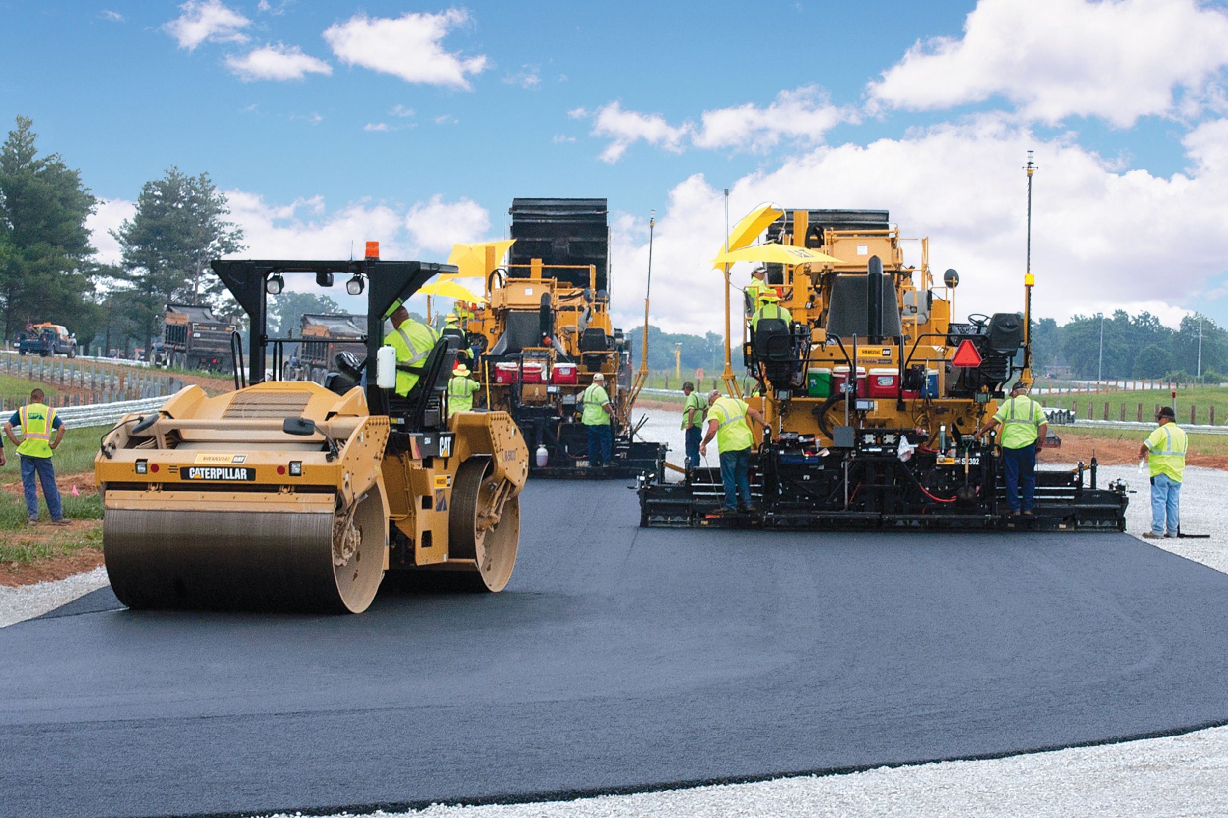 The specifications required echelon paving to eliminate a cold longitudinal joint.