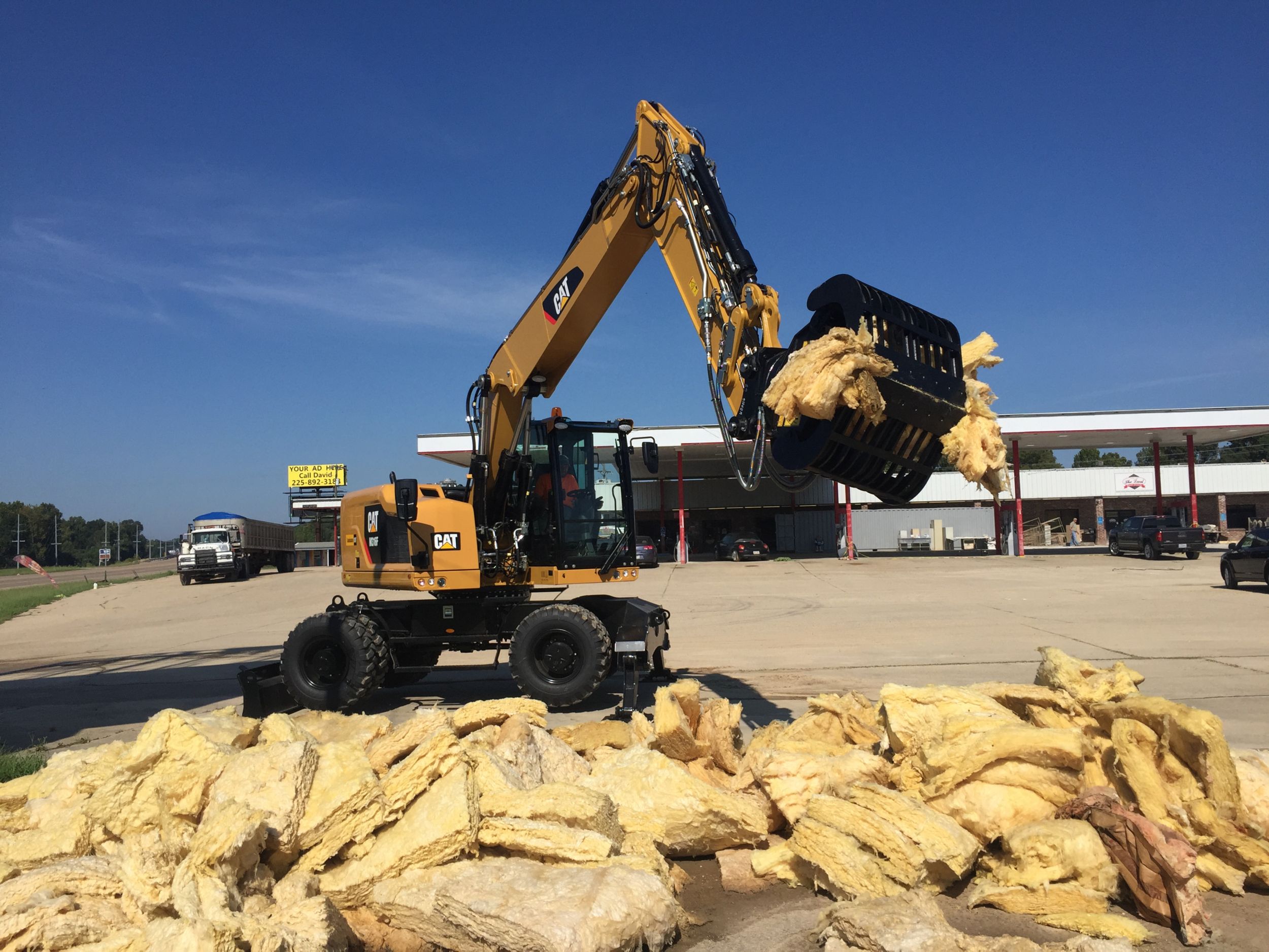 Cat® dealer Louisiana Cat located the machines and attachments and provided training to the customer.