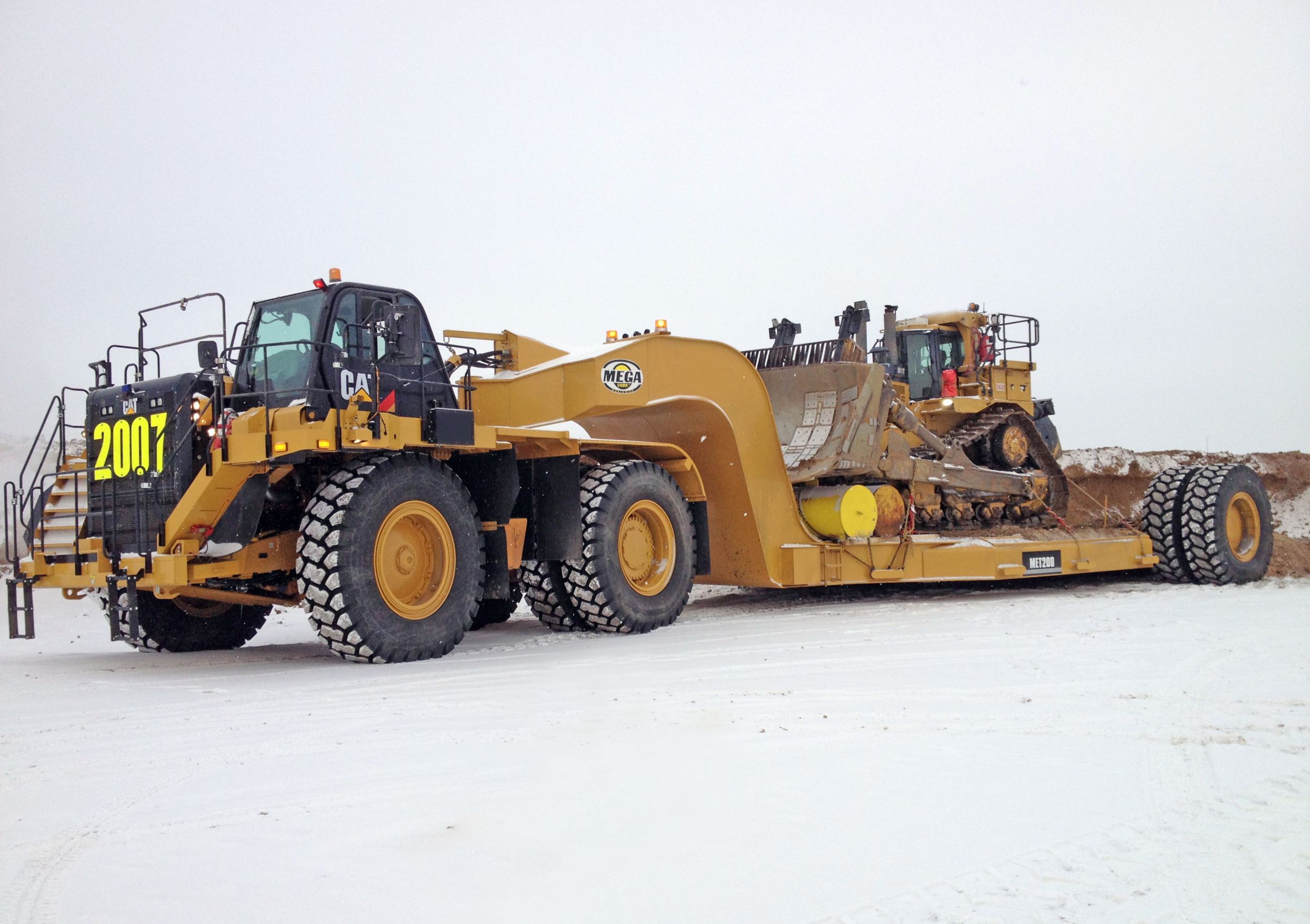 The Mega Equipment Trailer (MET) can be custom designed to fit dozers, excavators, shovels and other heavy equipment found in mines and on large earthmoving projects.