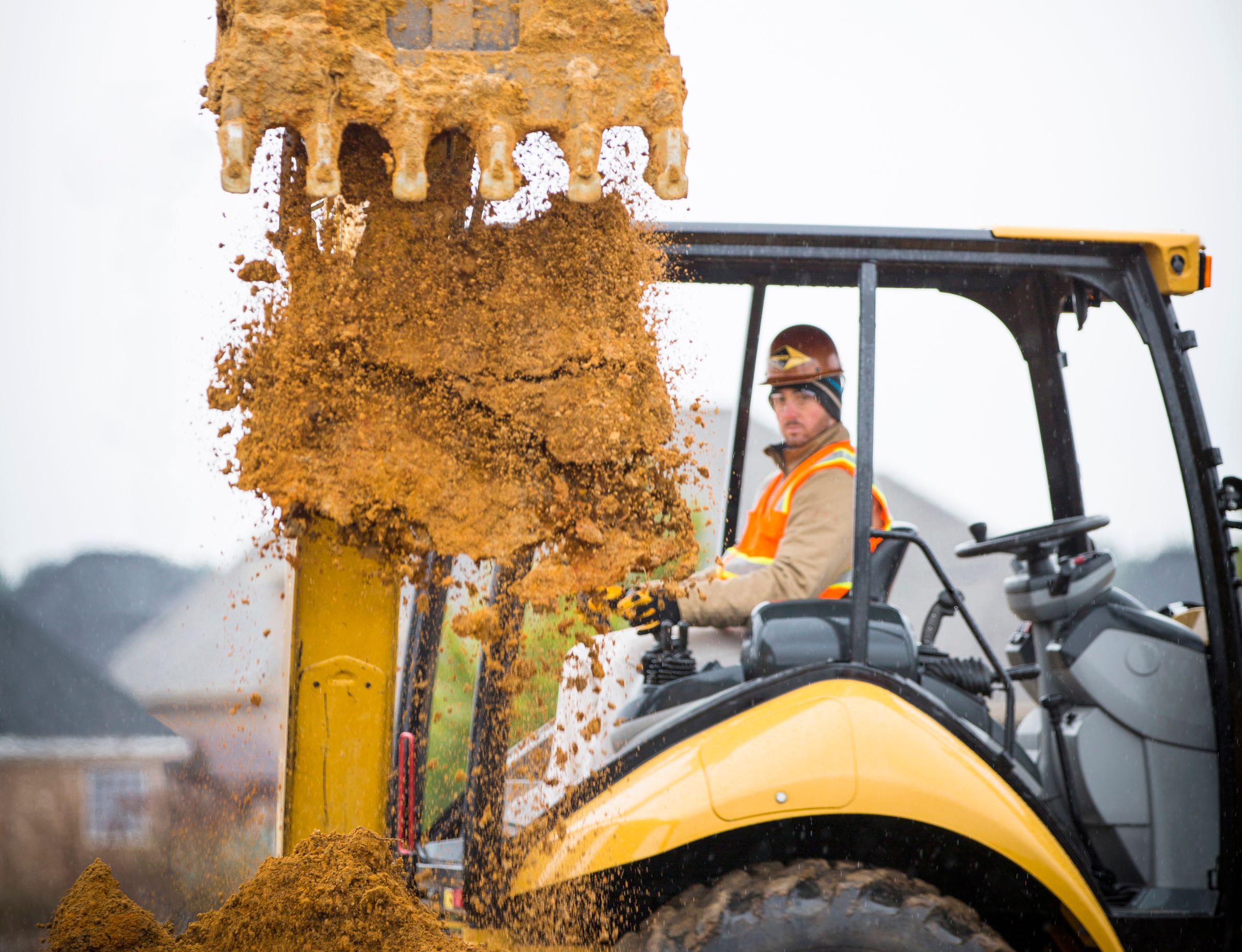 The Chipleys utilize a Cat® 420F IT Backhoe Loader to quickly move large quantities of material across long distances on vast jobsites.