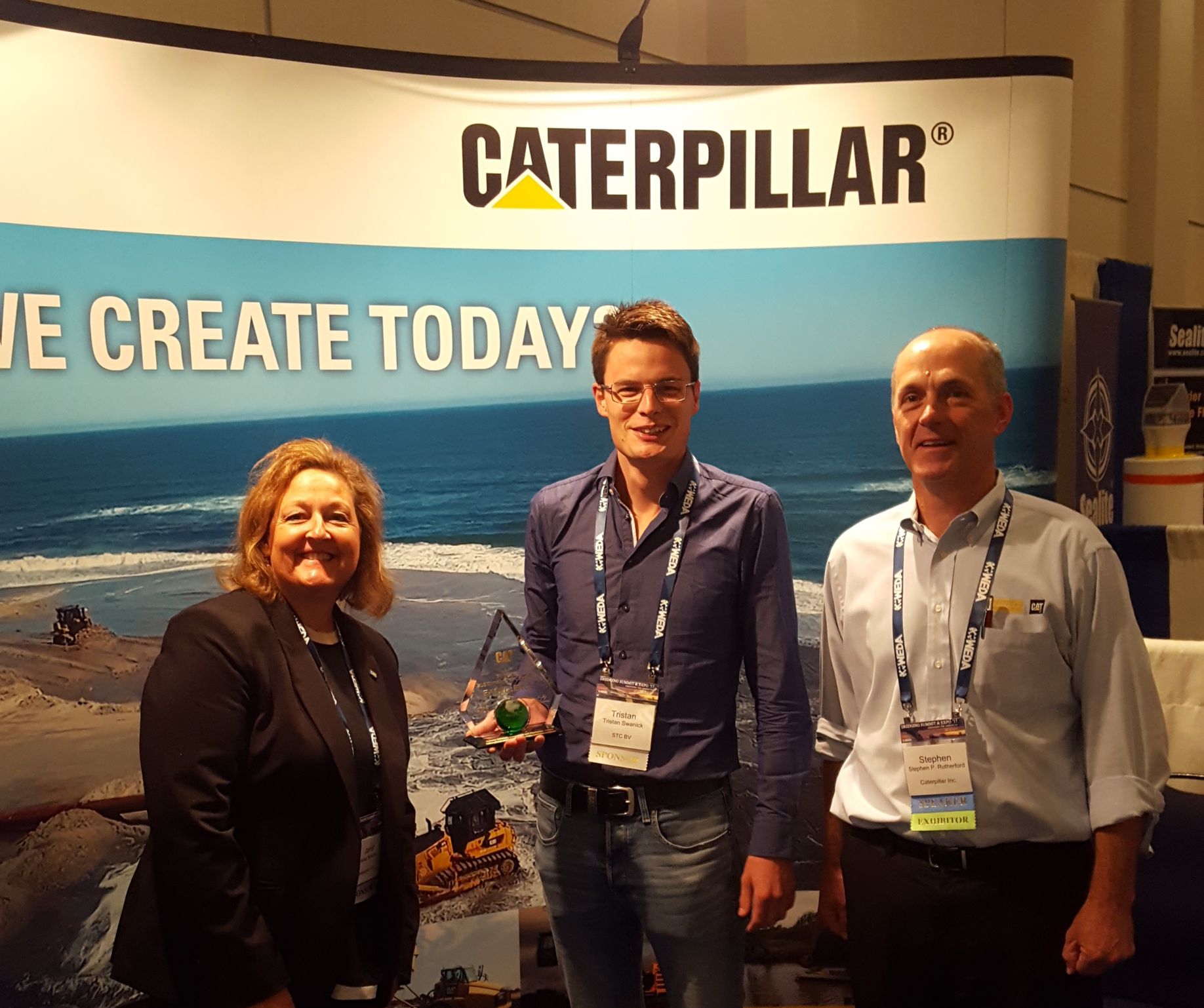 Caterpillar representatives Janet Kirkton and Stephen Rutherford presented Tristan Swanink of STC B.V. with our Caterpillar Excellence Award for Sustainability in Process Innovation.
