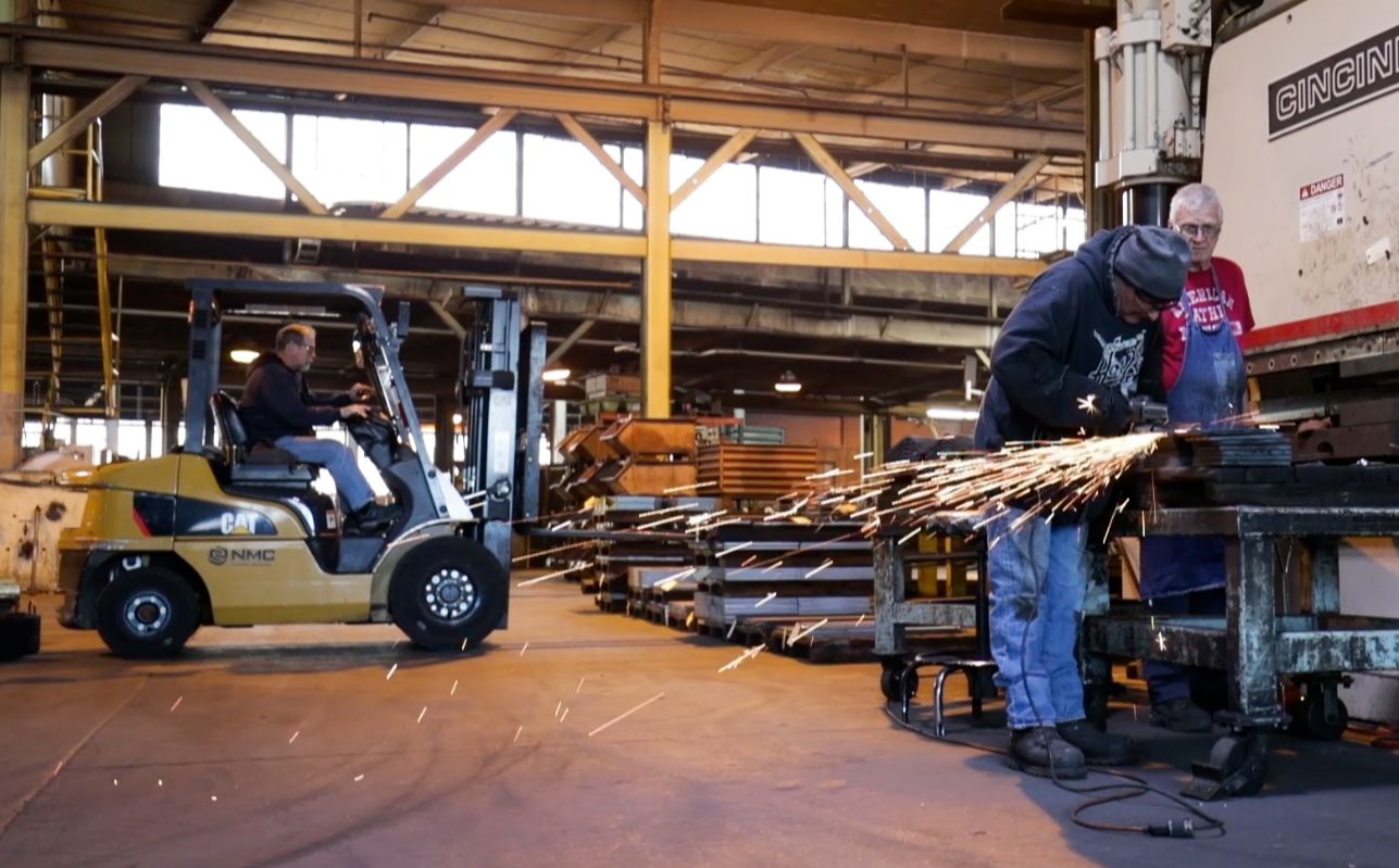 Hughes Brother has several buildings, including a manufacturing plant, across its 43 acres with rough terrain throughout.