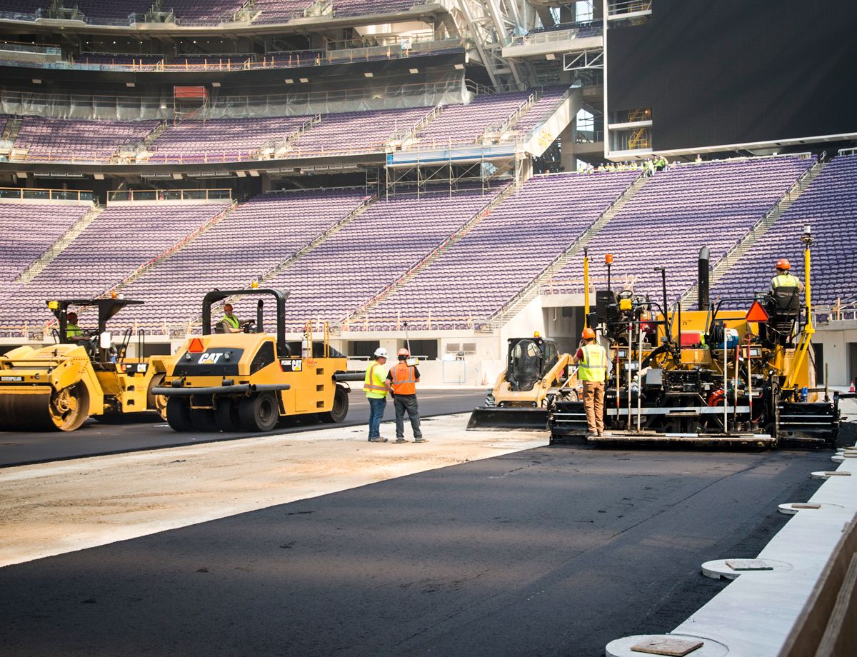 The team met the challenge of paving a stadium bowl that is oval-shaped, and includes concrete drainage and other details like conduit for end zone cameras.