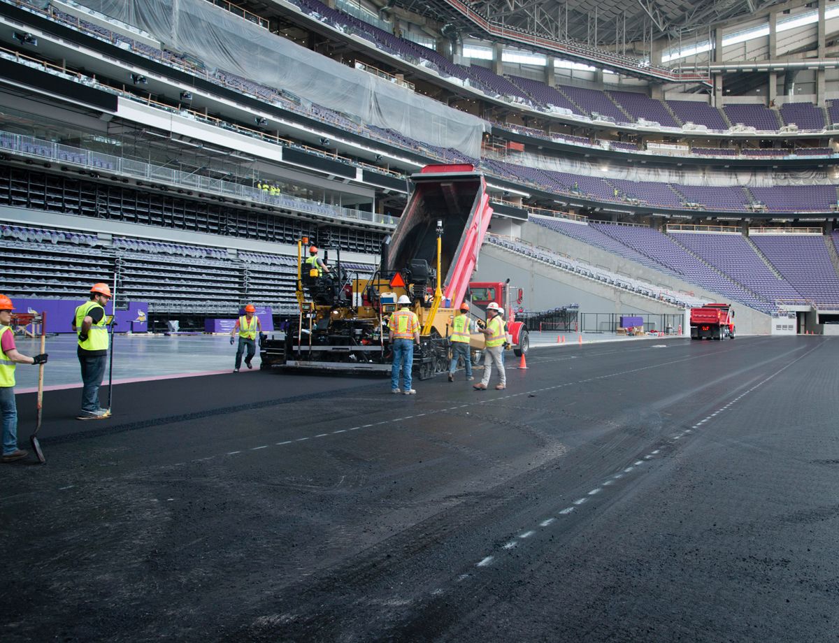 A Cat® AP1055E Paver with an AS2302C Screed laid down the mix with AccuGrade™ PCS900 is integrated with the Cat Grade Control factory 2D system.