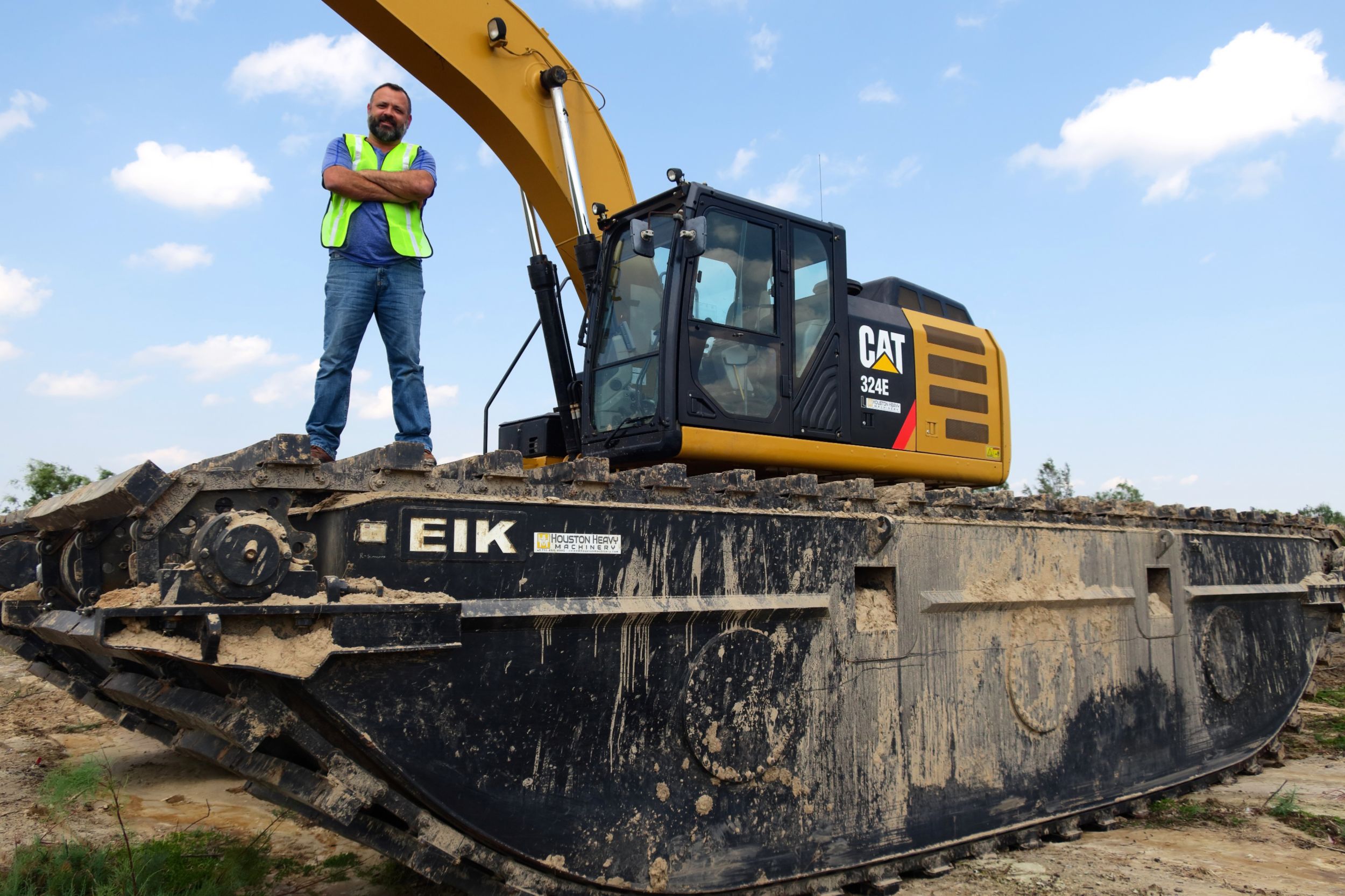 Steve with the Cat® 324E with an EIK AM250 amphibious undercarriage at one of the DAMP sites near the Houston Ship Channel.