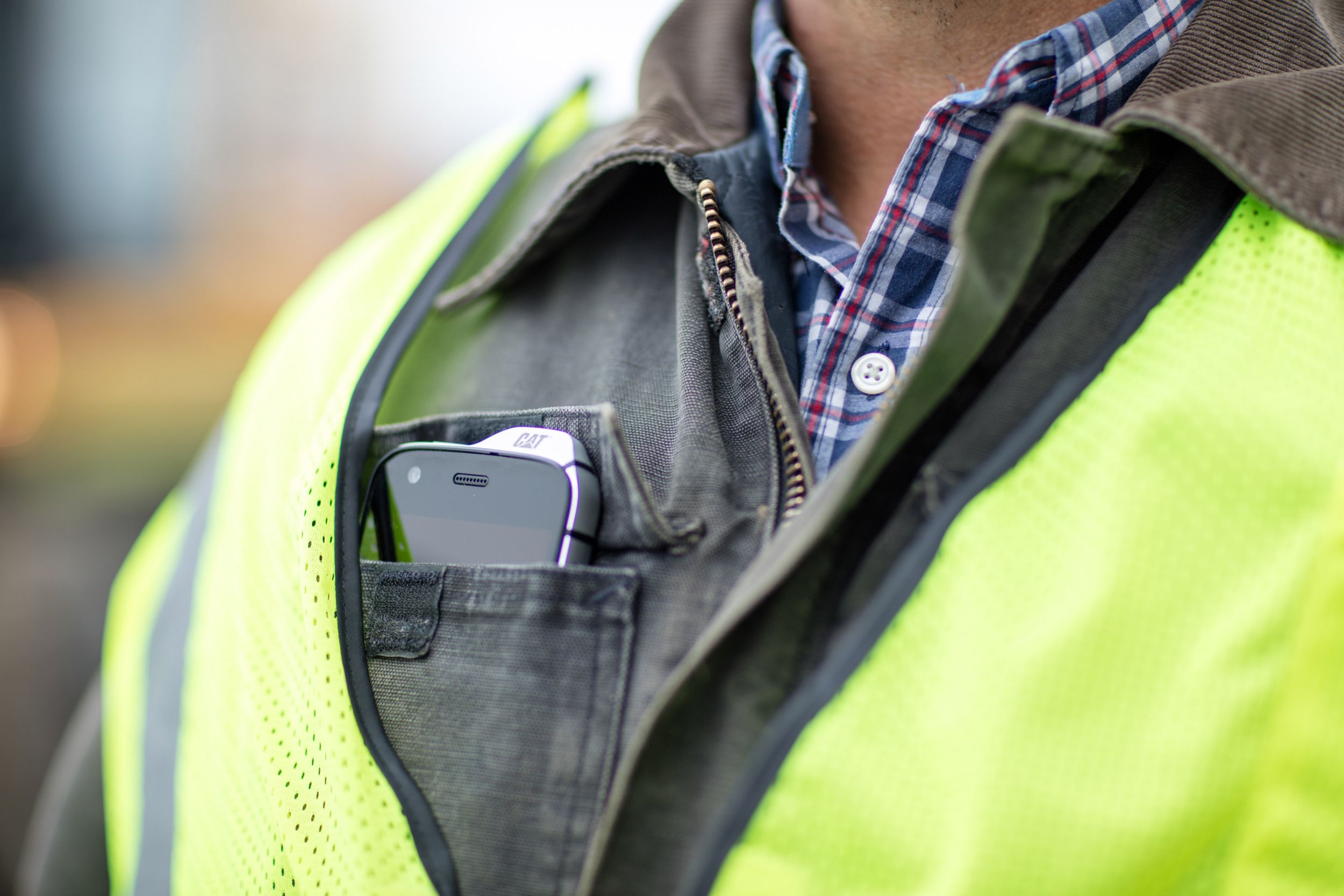 Mobile phone tucked in pocket