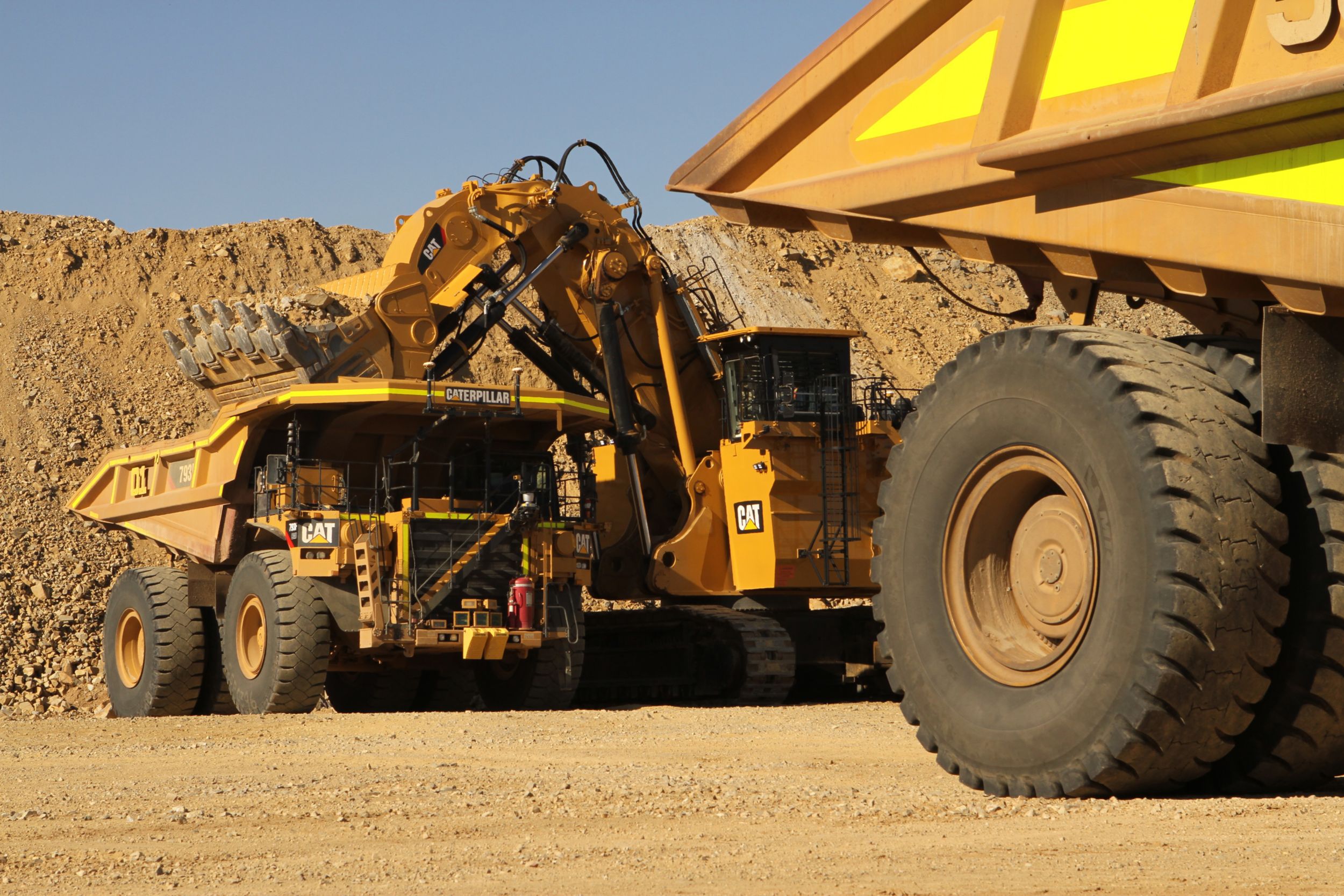 Cat 793F autonomous trucks at loading face