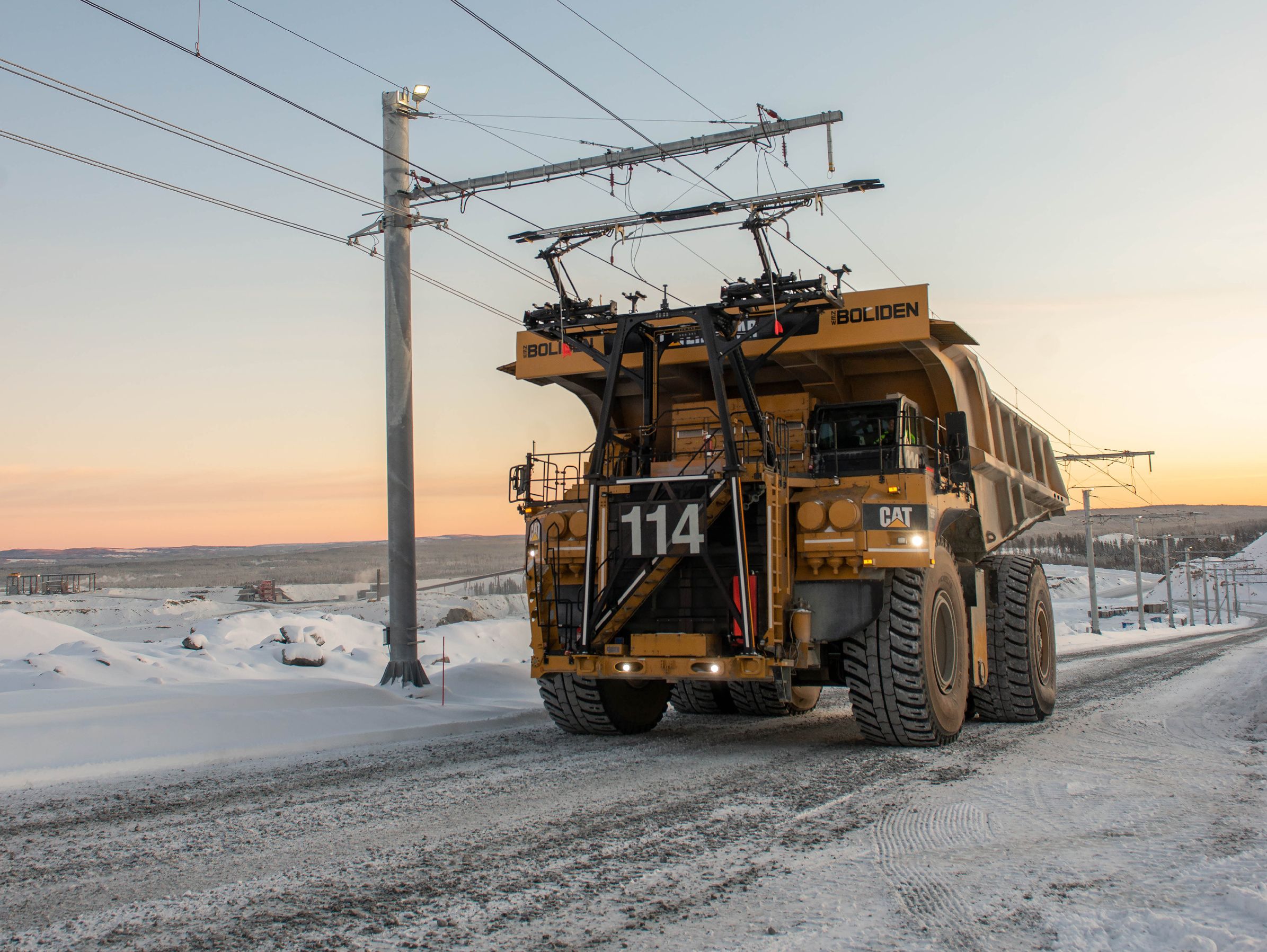 Cat 795 AC mining truck on trolley at Boliden Aitik mine