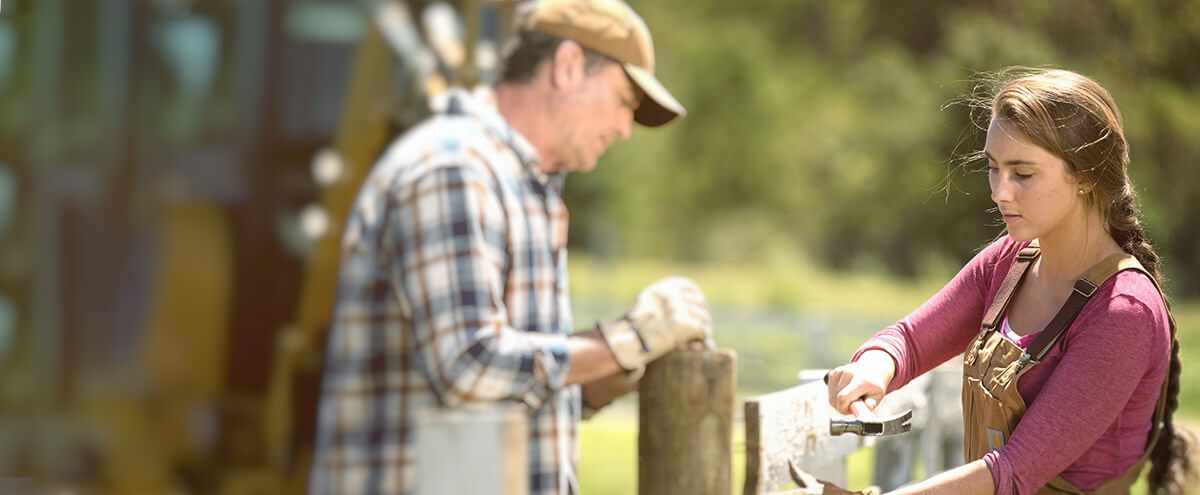 Father and daughter working together during COVID-19 pandemic