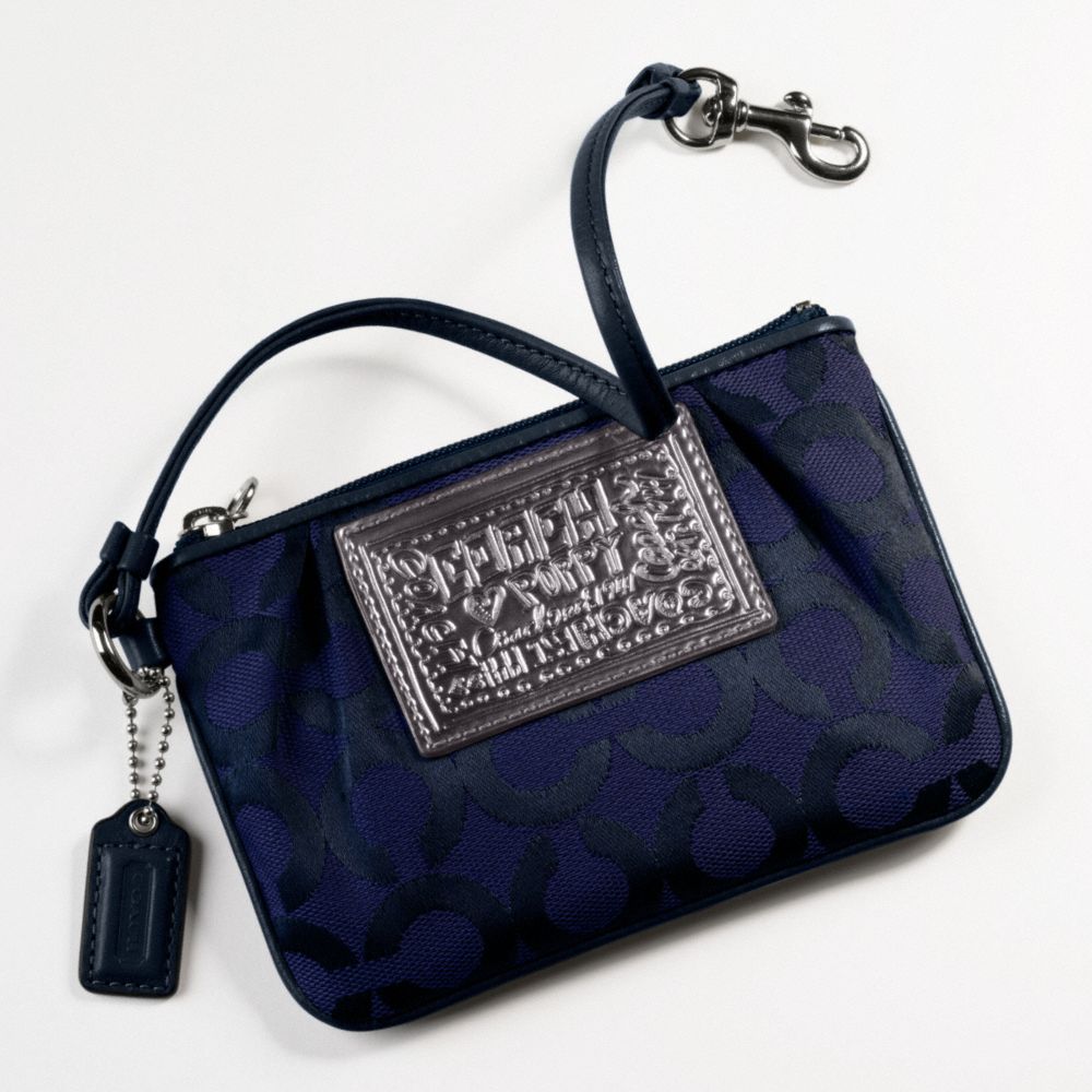 POPPY OP ART WRISTLET $48.00