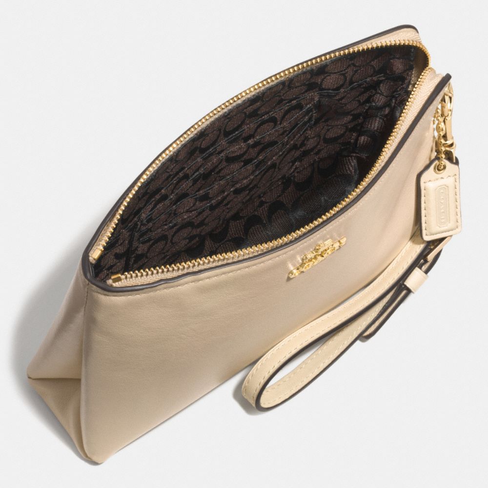 three coach wristlets
