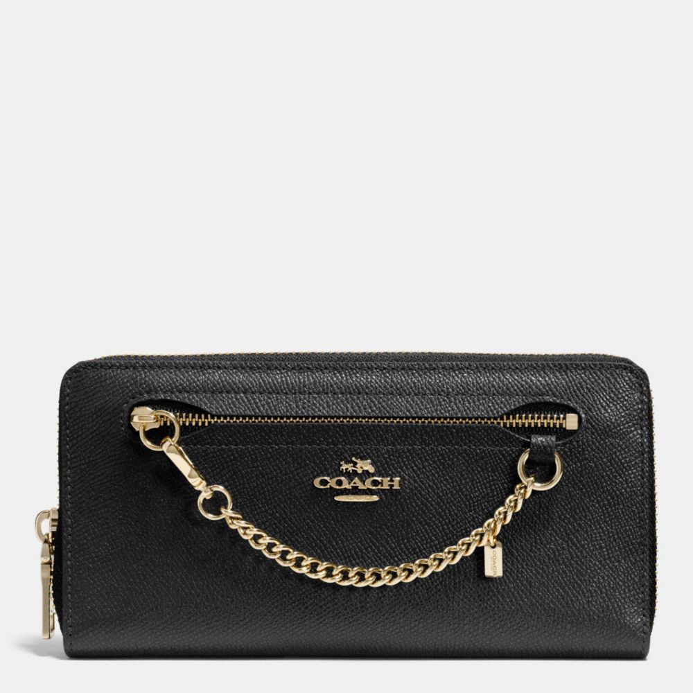 assorted coach wallets