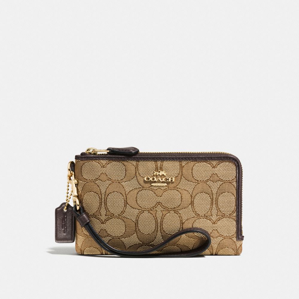 purple coach wristlets