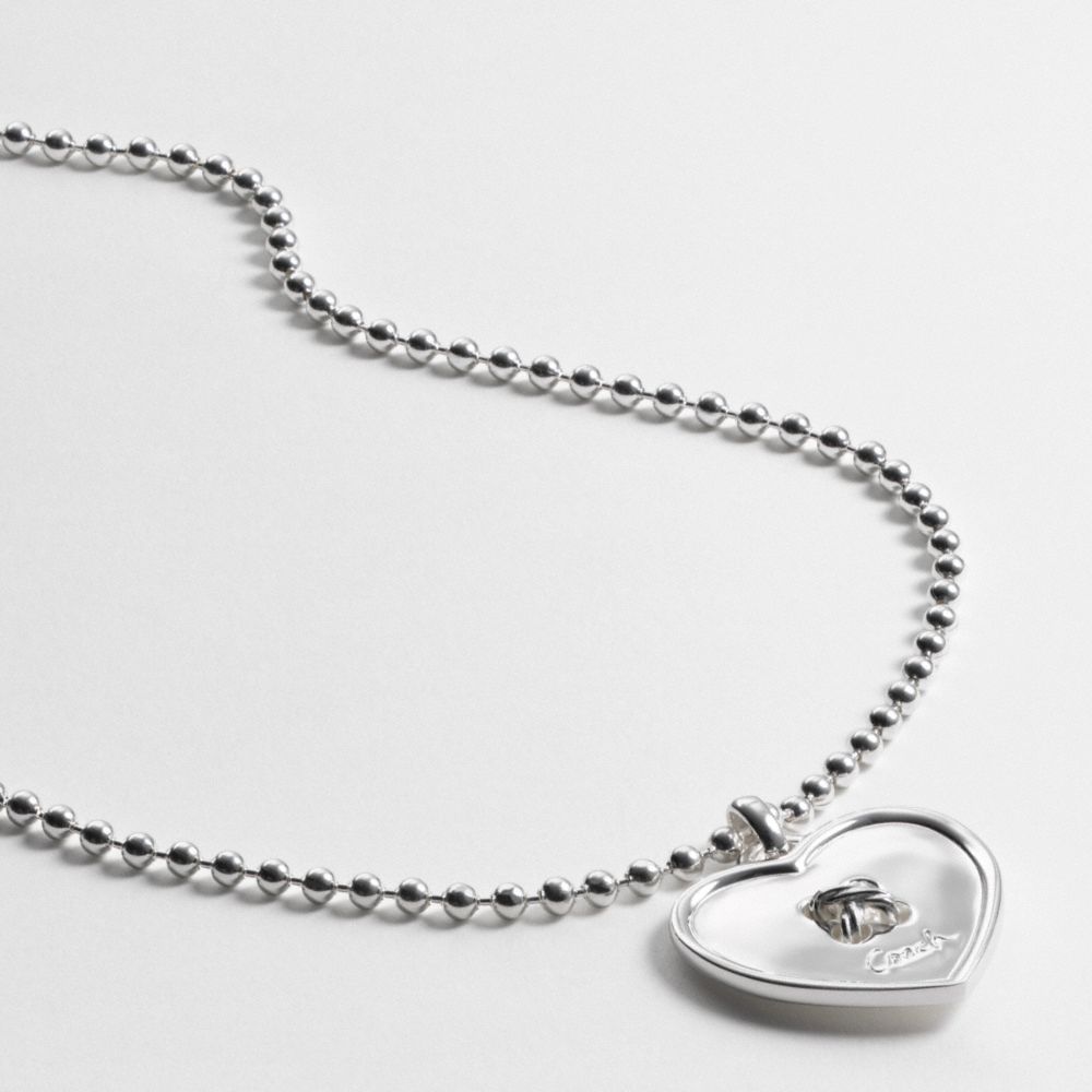 BUTTON HEART PENDANT NECKLACE $138.00