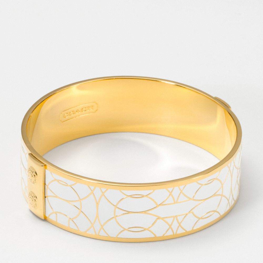 OUTLINE OP ART BANGLE $98.00