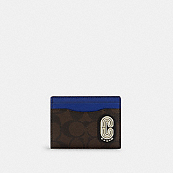 COACH Magnetic Card Case In Colorblock Signature Canvas With Coach Patch - QB/CHARCOAL/SPORT BLUE MULTI - C7011