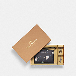 COACH Boxed Corner Zip Wristlet With Snowman Print - SILVER/MIDNIGHT MULTI - C7401