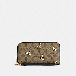 COACH Long Zip Around Wallet In Signature Canvas With Bee Print - GOLD/KHAKI MULTI - C8675