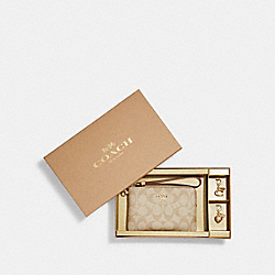COACH Boxed Corner Zip Wristlet In Signature Canvas - GOLD/LIGHT KHAKI/FADED BLUSH - C8726