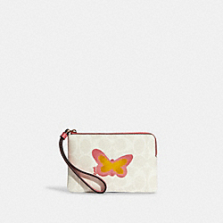 COACH Corner Zip Wristlet In Signature Canvas With Butterfly - GOLD/CHALK/TAFFY MULTI - C9589