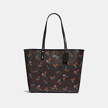COACH REVERSIBLE CITY TOTE IN SIGNATURE CANVAS WITH CHERRY PRINT - BROWN MULTI/SILVER - F31389