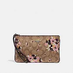COACH LARGE WRISTLET IN SIGNATURE CANVAS WITH FLORAL FLOCKING - KHAKI MULTI /LIGHT GOLD - F31770