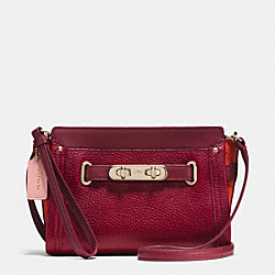 COACH COACH SWAGGER WRISTLET IN COLORBLOCK PEBBLE LEATHER - LIGHT GOLD/BLACK CHERRY - F53479