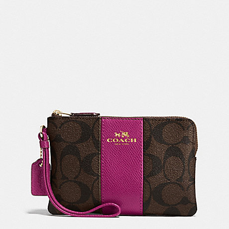 COACH CORNER ZIP WRISTLET IN SIGNATURE COATED CANVAS WITH LEATHER STRIPE - IMITATION GOLD/BROWN/FUCHSIA - f54629