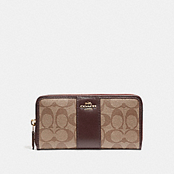 COACH ACCORDION ZIP WALLET IN SIGNATURE COATED CANVAS WITH LEATHER STRIPE - LIGHT GOLD/KHAKI - F54630