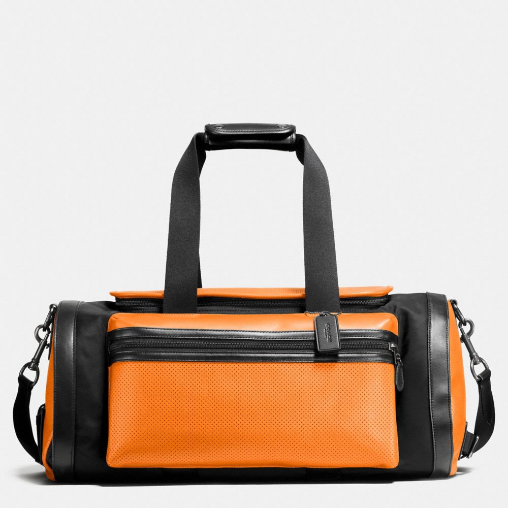 COACH TERRAIN GYM BAG IN PERFORATED MIXED MATERIALS - ORANGE/GRAPHITE - f56875