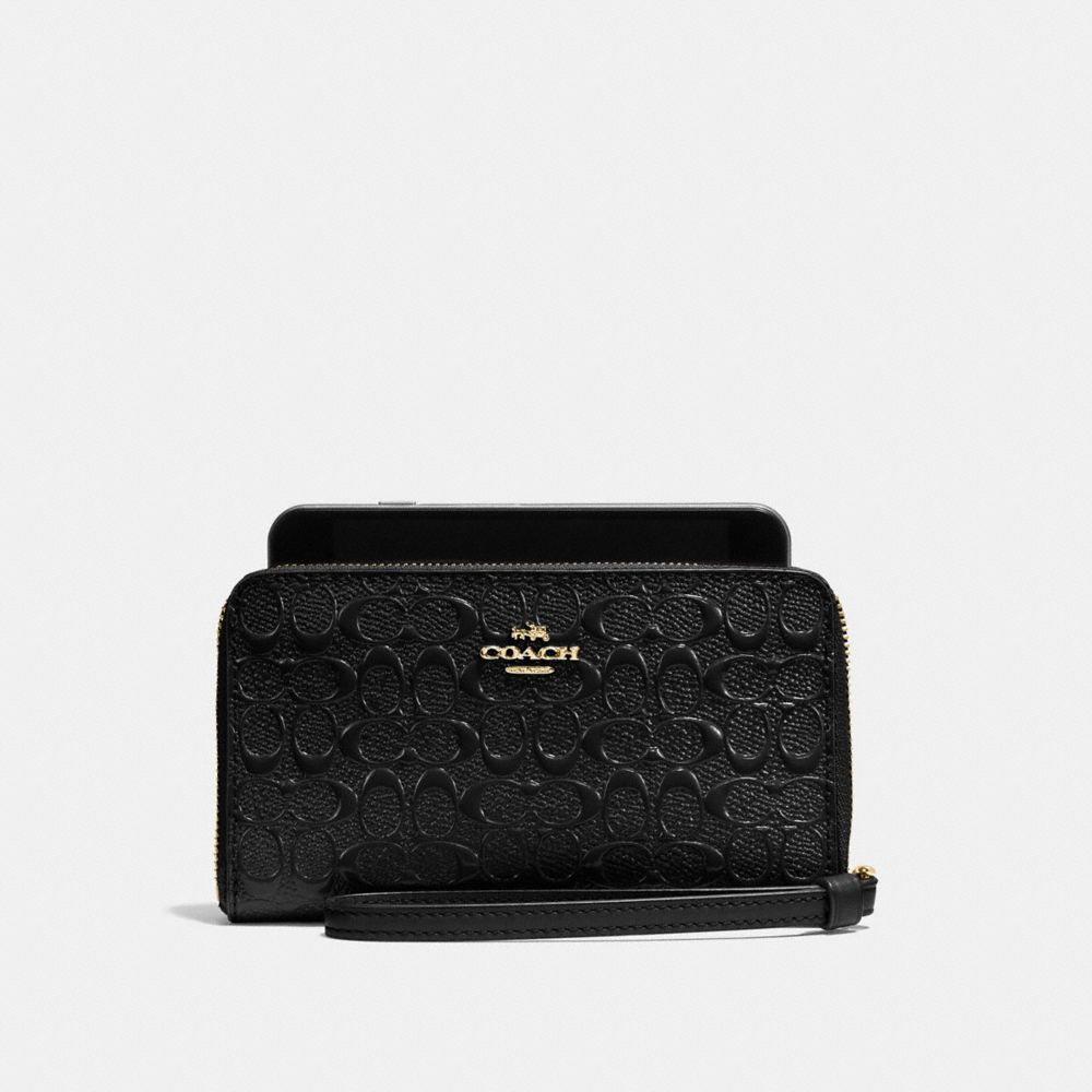 PHONE WALLET IN SIGNATURE DEBOSSED PATENT LEATHER - COACH f57469 - IMITATION GOLD/BLACK