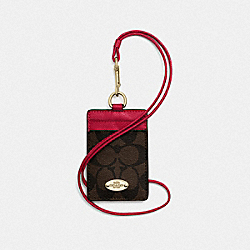 COACH SIGNATURE LANYARD ID CASE - IMITATION GOLD/BROWN TRUE RED - F63274