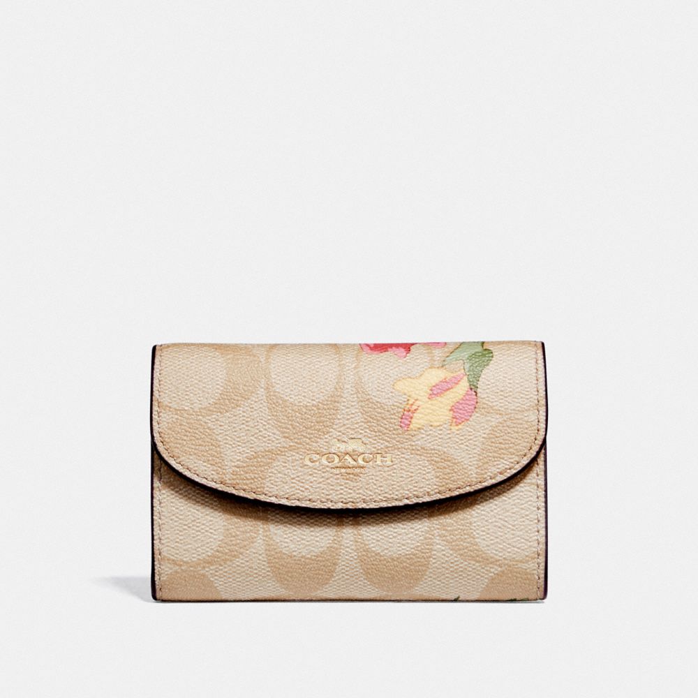 COACH KEY CASE IN SIGNATURE CANVAS WITH LILY PRINT - LIGHT KHAKI/PINK MULTI/IMITATION GOLD - F73366