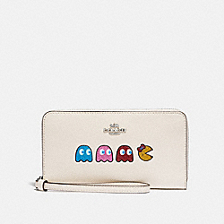 COACH LARGE PHONE WALLET WITH MS. PAC-MAN ANIMATION - CHALK MULTI/SILVER - F73444