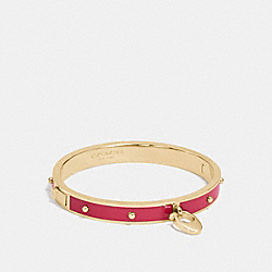 COACH ENAMEL AND RIVETS SIGNATURE C HINGED BANGLE - GOLD/TRUE RED - F86794