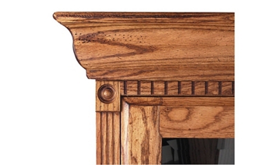 Subtle distressed detail includes rosettes, crown dentil moldings and fluted railings