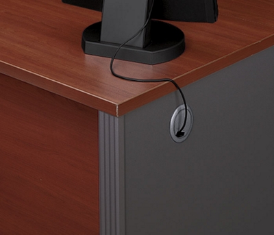 Grommet hole in side panel for clutter free desktop