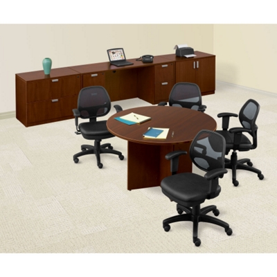 Table in a room scene surrounded by Mesh Chairs.