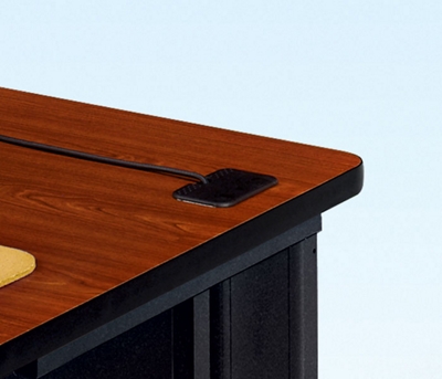 Desktop grommets keep cables separate, desks clear