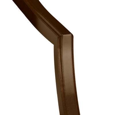 Hand-crafted edge detailing complements graceful, curved arms.