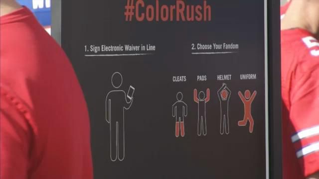 Color Rush: Buffalo Bills fans get painted red at New Era Field tent 